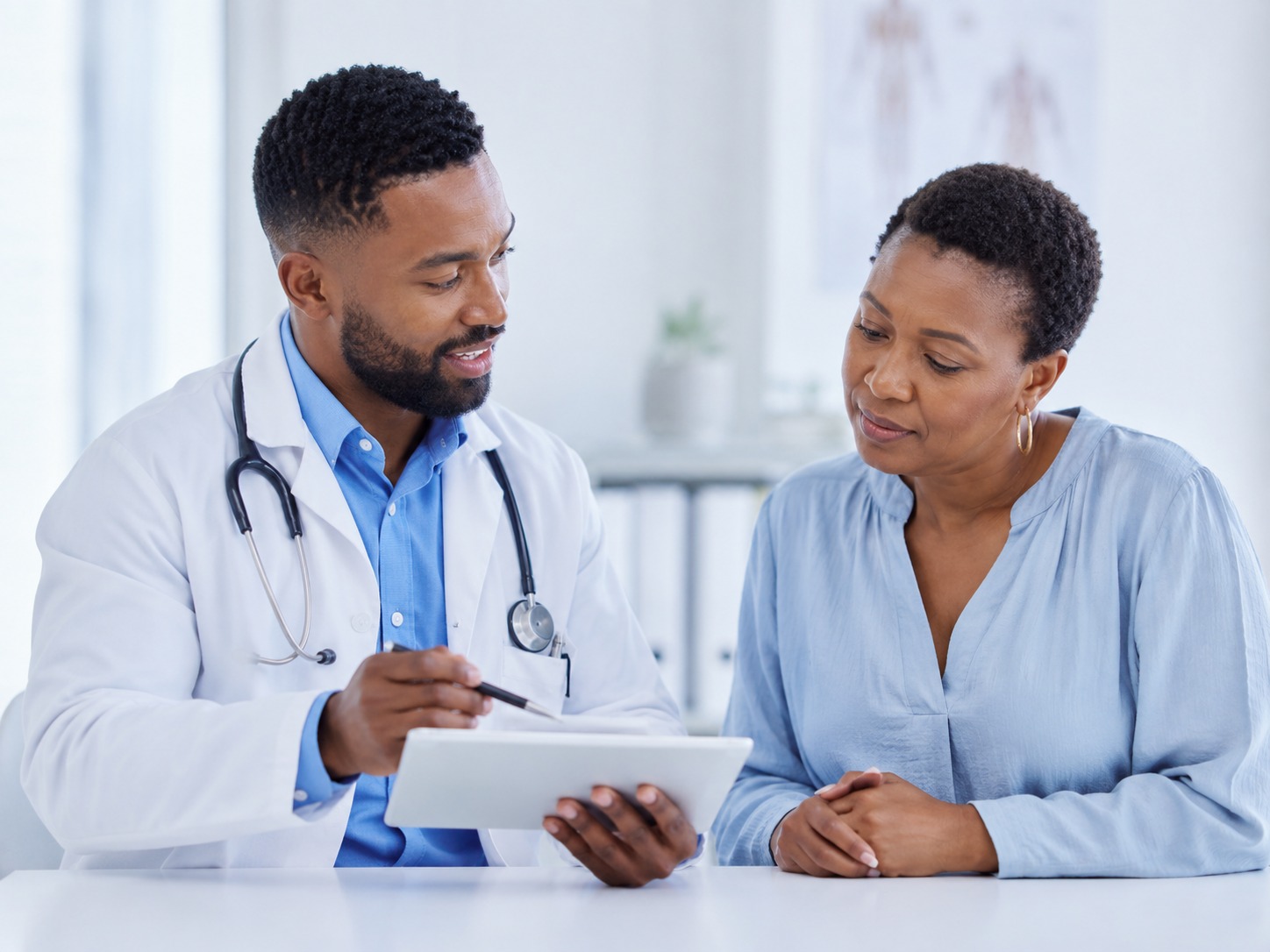 Clinician explaining treatment options to a patient